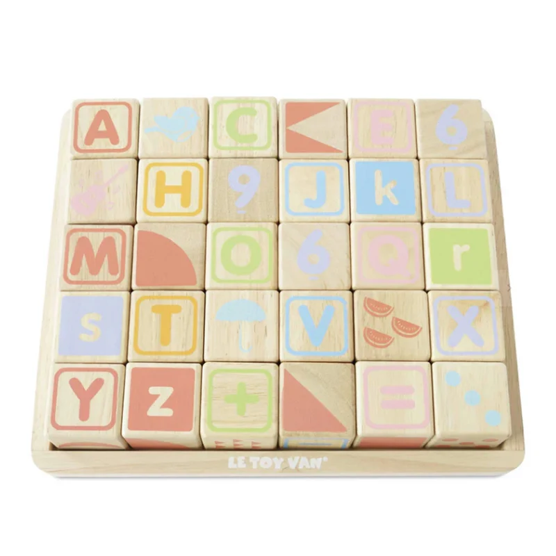 Lernwürfel mit Zahlen, Buchstaben und Motiven