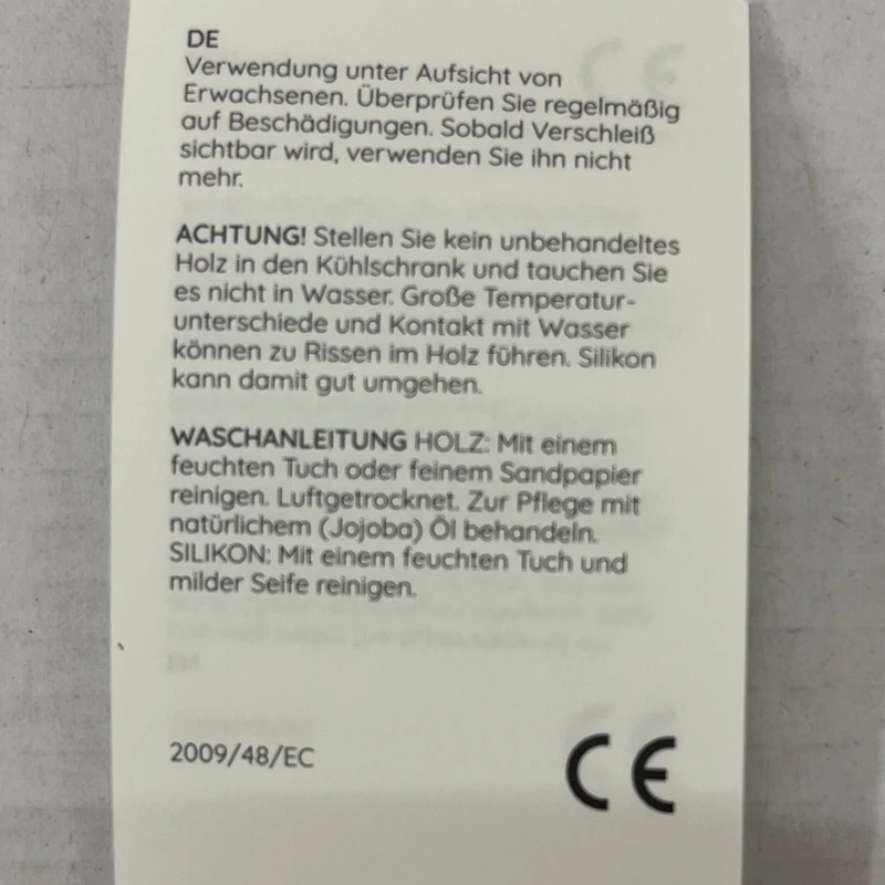 Rassel aus Holz - DAISY Blume