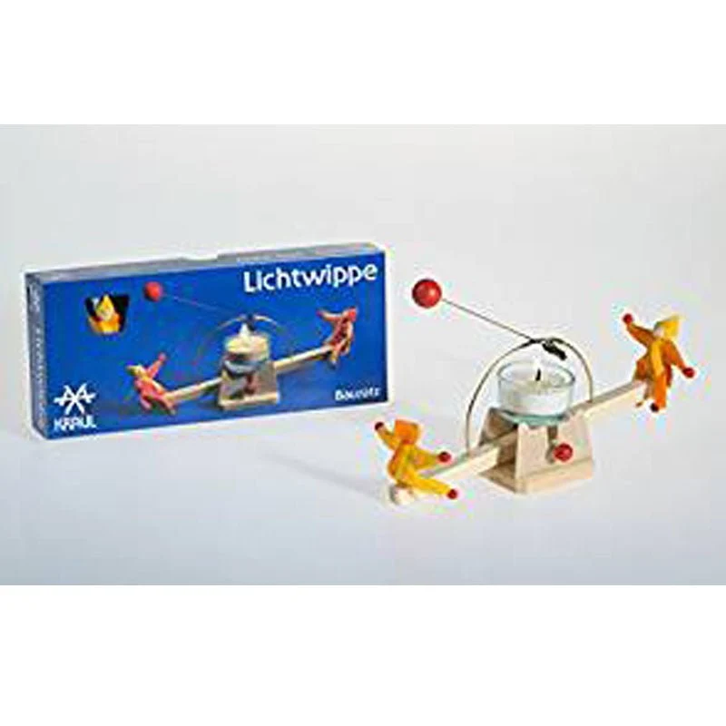 Kraul 7503 Lichtwippe / Feuerschaukel mit Püppchen in gelb-orange