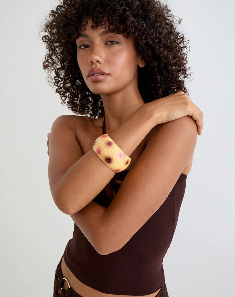 Vintage-Armreif mit rosa und violetten Punkten