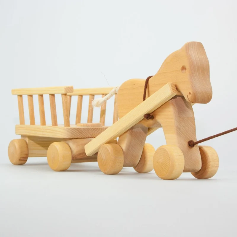 Nachziehpferd mit Leiterwagen