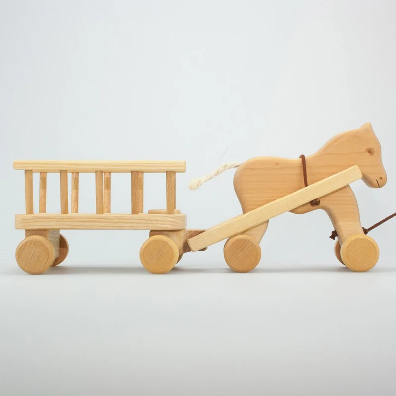 Nachziehpferd mit Leiterwagen
