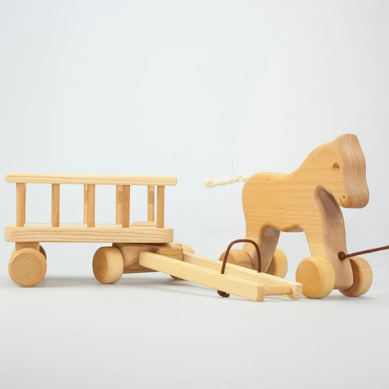 Nachziehpferd mit Leiterwagen
