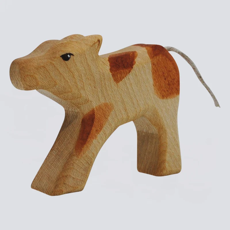 Holzwald Holzfigur Kalb trinkend
