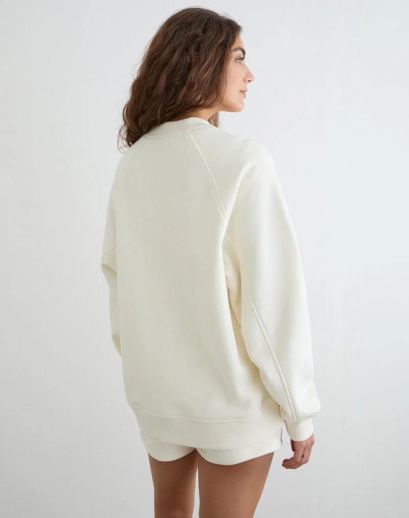 Jorai-Pullover in Winterweiß mit farblich abgestimmter „M“-Stickerei