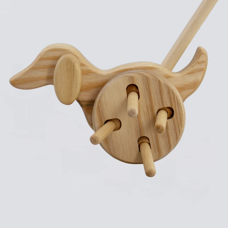 Schiebetier Hund mit Rasselstäbchen