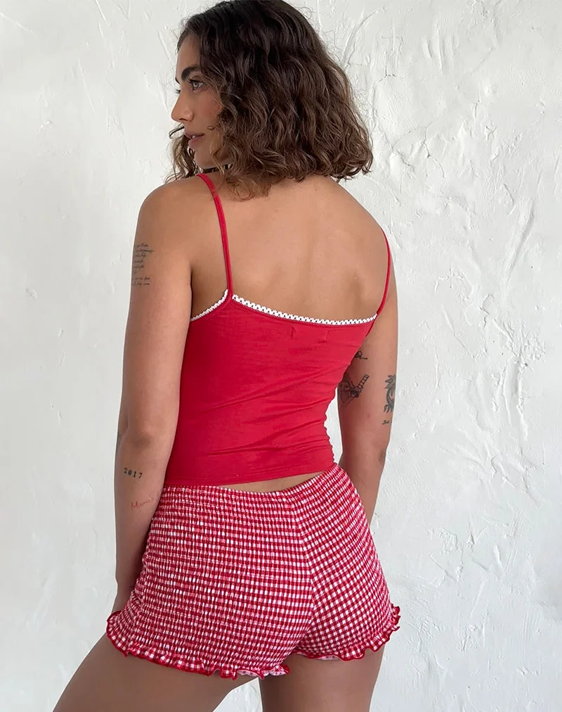 Suna Vest Top in Tangorot mit elfenbeinfarbenem Besatz